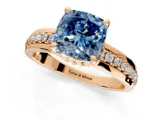 Solitaire Engagement Ring Setting for Fancy Blue Cushion Cut Center with Raised Channel Band and Prong Head in Rose Gold