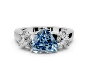 3 Stone Engagement Ring Setting for Fancy Blue Heart-Shaped Center with Raised Basket Heads and Prong Head in Sterling Silver