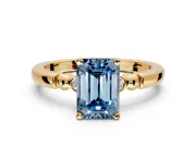 Solitaire Engagement Ring Setting for Fancy Blue Emerald Cut Center with Beaded Shoulders and Prong Head in Yellow Gold