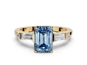 Bar-Set Engagement Ring Setting for Fancy Blue Emerald Cut Center with Tapered Baguette Accents and Prong Head in Yellow Gold