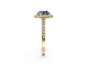 Halo Engagement Ring Setting for Fancy Blue Round Cut Center with Narrowing Pave Band and Prong Head in Yellow Gold