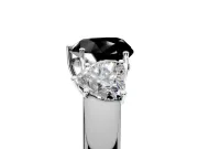 3 Stone Engagement Ring Setting for Fancy Black Heart-Shaped Center with Raised Basket Heads and Prong Head in Platinum