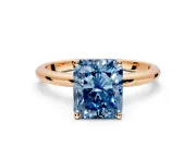 Hidden Halo Engagement Ring Setting for Fancy Blue Radiant Cut Center with Thin Round-Wire Band and Prong Head in Rose Gold