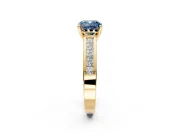 Solitaire Engagement Ring Setting for Fancy Blue Cushion Cut Center with Princess Cut Channel Band and Prong Head in Yellow Gold