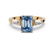 3 Stone Engagement Ring Setting for Fancy Blue Emerald Cut Center with Baguette Accents and Prong Head in Yellow Gold