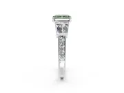 Channel-Set Engagement Ring Setting for Fancy Green Radiant Cut Center with Baguette Band and Prong Head in White Gold