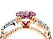 Channel-Set Engagement Ring Setting for Fancy Pink Round Cut Center with Baguette Band and Prong Head in Rose Gold