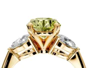 3 Stone Engagement Ring Setting for Fancy Yellow Round Cut Center with Large Pear-Shaped Accents and Prong Head in Yellow Gold