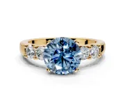 5 Stone Engagement Ring Setting for Fancy Blue Round Cut Center with Plain Band and Prong Head in Yellow Gold