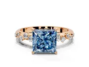 Cluster Engagement Ring Setting for Fancy Blue Princess Cut Center with Round Cut Accent Band and Prong Head in Rose Gold