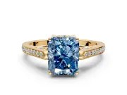 Cathedral Engagement Ring Setting for Fancy Blue Radiant Cut Center with Antique-Style Pave Band and Prong Head in Yellow Gold