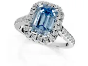 Halo Engagement Ring Setting for Fancy Blue Emerald Cut Center with Raised Halo, Pave Band and Prong Head in Sterling Silver