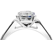 Solitaire Engagement Ring Setting for Radiant Cut Center with Channel Accents and Prong Head in Platinum