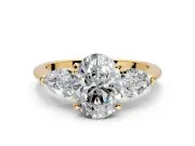 3 Stone Engagement Ring Setting for Oval Center with Large Pear-Shaped Accents and Prong Head in Yellow Gold