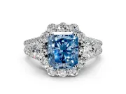 Halo Engagement Ring Setting for Fancy Blue Radiant Cut Center with Two-Strand Split Shank and Prong Head in Platinum