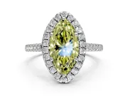 Halo Engagement Ring Setting for Fancy Yellow Marquise Center with Narrowing Pave Band and Prong Head in Platinum