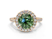 Halo Engagement Ring Setting for Fancy Green Round Cut Center with Narrowing Pave Band and Prong Head in Rose Gold