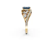 Halo Engagement Ring Setting for Fancy Blue Emerald Cut Center with Marquise and Pave Bypass Band and Prong Head in Yellow Gold