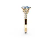 Solitaire Engagement Ring Setting for Fancy Blue Pear-Shaped Center with Crossover Accents and Prong Head in Yellow Gold