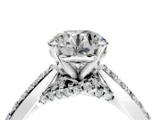 Solitaire Engagement Ring Setting for Round Cut Center with Crossover Accents and Prong Head in Platinum