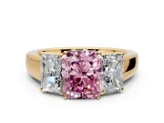 3 Stone Engagement Ring Setting for Fancy Pink Radiant Cut Center with Raised Basket Heads and Prong Head in Yellow Gold