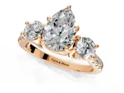 3 Stone Engagement Ring Setting for Pear-Shaped Center with Crossover Basket, Pave Band and Prong Head in Rose Gold