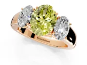 3 Stone Engagement Ring Setting for Fancy Yellow Oval Center with Raised Basket Heads and Prong Head in Rose Gold