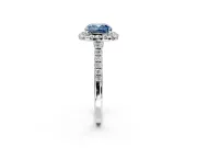 Halo Engagement Ring Setting for Fancy Blue Cushion Cut Center with Narrowing Pave Band and Prong Head in Platinum