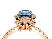 Halo Engagement Ring Setting for Fancy Blue Emerald Cut Center with Openwork Halo, Pave Band and Prong Head in Rose Gold