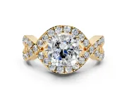 Halo Engagement Ring Setting for Cushion Cut Center with Pave Infinity Twist Band and Prong Head in Yellow Gold