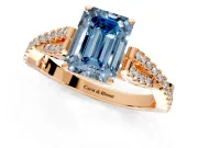 Solitaire Engagement Ring Setting for Fancy Blue Emerald Cut Center with Twisted Pave Split Shank and Prong Head in Rose Gold