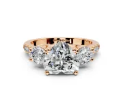 3 Stone Engagement Ring Setting for Heart-Shaped Center with Crossover Basket, Pave Band and Prong Head in Rose Gold