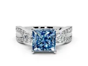 3 Stone Engagement Ring Setting for Fancy Blue Princess Cut Center with Pave Twist Band and Prong Head in Sterling Silver