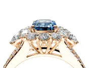 Halo Engagement Ring Setting for Fancy Blue Emerald Cut Center with Two-Strand Split Shank and Prong Head in Rose Gold