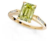 Solitaire Engagement Ring Setting for Fancy Yellow Emerald Cut Center with Channel Accents and Prong Head in Yellow Gold