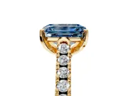 Solitaire Engagement Ring Setting for Fancy Blue Emerald Cut Center with Partway Pave Band and Prong Head in Yellow Gold
