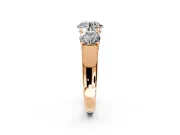 3 Stone Engagement Ring Setting for Round Cut Center with Raised Basket Heads and Prong Head in Rose Gold