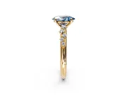 Cluster Engagement Ring Setting for Fancy Blue Oval Center with Round Cut Accent Band and Prong Head in Yellow Gold