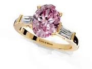 3 Stone Engagement Ring Setting for Fancy Pink Oval Center with Channel Baguette Accents and Prong Head in Yellow Gold