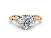 3 Stone Engagement Ring Setting for Heart-Shaped Center with Wide Plain Band and Prong Head in Rose Gold
