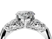 Cluster Engagement Ring Setting for Heart-Shaped Center with Round Cut Accent Frame and Prong Head in Platinum