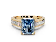 Solitaire Engagement Ring Setting for Fancy Blue Radiant Cut Center with Channel Band and Double Claw Prong Head in Yellow Gold