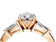 3 Stone Engagement Ring Setting for Pear-Shaped Center with Channel Baguette Accents and Prong Head in Rose Gold