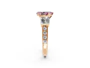 Channel-Set Engagement Ring Setting for Fancy Pink Pear-Shaped Center with Baguette Band and Prong Head in Rose Gold