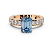 Solitaire Engagement Ring Setting for Fancy Blue Emerald Cut Center with Channel-Set Accents and Prong Head in Rose Gold