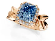Halo Engagement Ring Setting for Fancy Blue Radiant Cut Center with Floral Band and Prong Head in Rose Gold