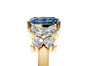 Floral Engagement Ring Setting for Fancy Blue Emerald Cut Center with Marquise Cluster Shoulders and Prong Head in Yellow Gold