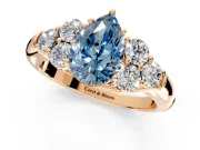 Cluster Engagement Ring Setting for Fancy Blue Pear-Shaped Center with Round Cut Accent Frame and Prong Head in Rose Gold