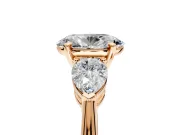 3 Stone Engagement Ring Setting for Oval Center with Large Pear-Shaped Accents and Prong Head in Rose Gold