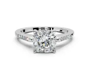 Solitaire Engagement Ring Setting for Cushion Cut Center with Channel Accents and Prong Head in Platinum